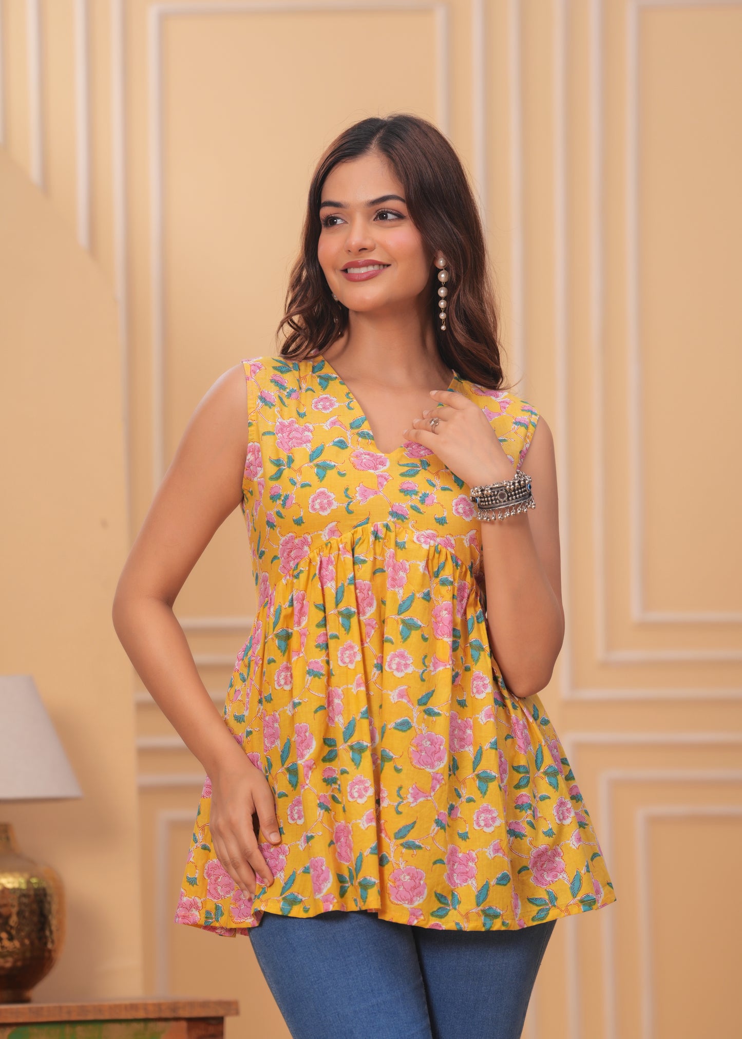 Yellow Floral Sleeveless Peplum Top