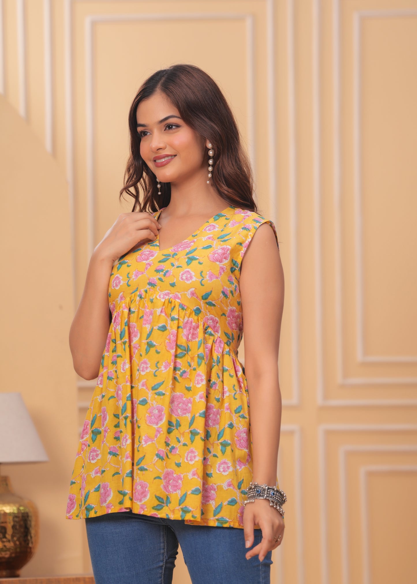 Yellow Floral Sleeveless Peplum Top